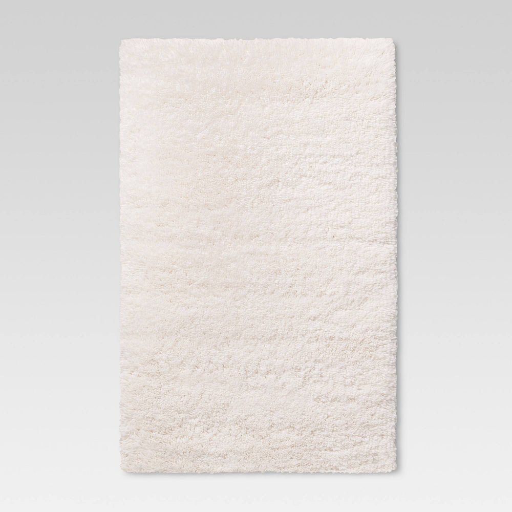 4'x5'6" Cream Plush Shag Washable Accent Rug - Room Essentials
